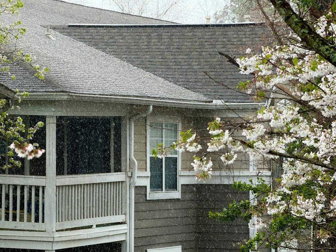 Homeowner meeting with contractor to discuss home improvement project and timeline